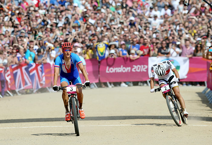 Olympic Mountain Biking: Winner from CZE Jaroslav Kulhavy crosses the finish line