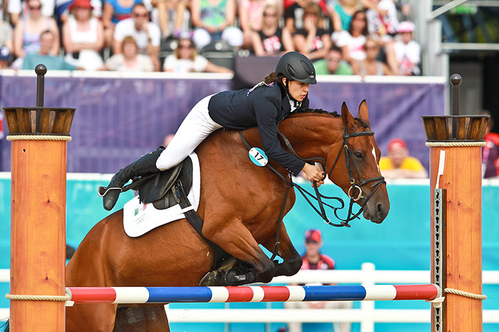 Modern Pentathlon Oly: Tamara Vega falls of her horse Douce de Roulad during the Show Jumping