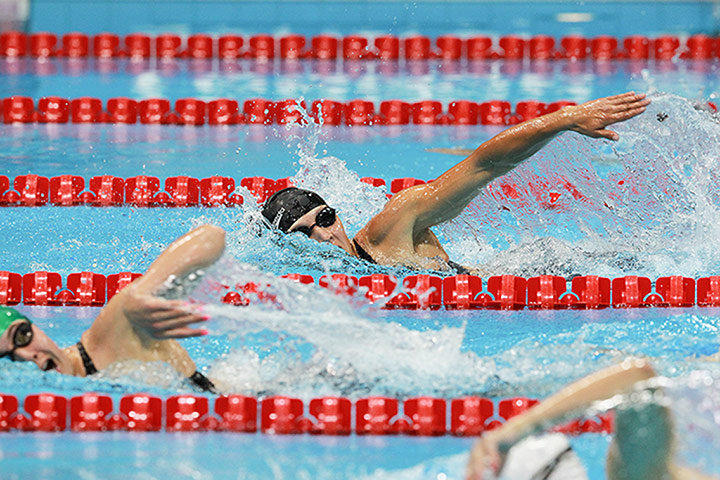 Modern Pentathlon Oly: Katarzyna of Poland swimming in the second heat of the women's 200m