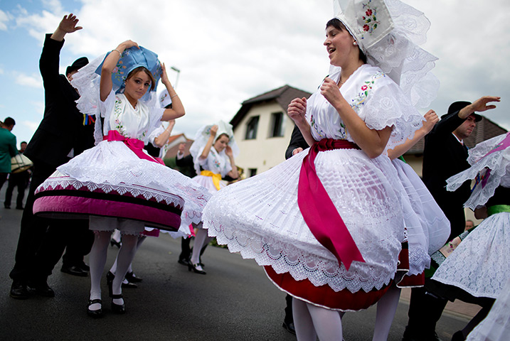 24 hours in pictures: Sorbian women and men in traditional costumes dance