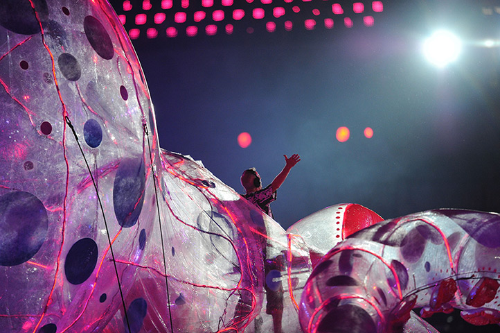 24 hours in pictures: Fat Boy Slim performs at the Olympic stadium