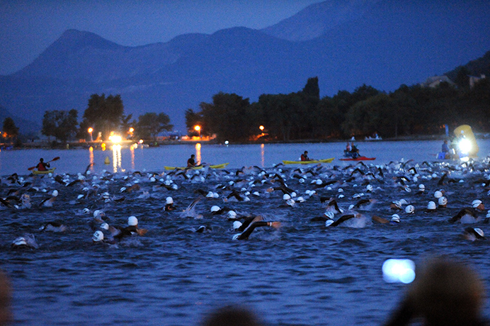 24 hours in pictures: Competitors swim during the triathlon in Embrun, France