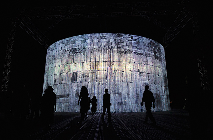 24 hours in pictures: Visitors walk past Ron Arad's video installation in the Art Garden at the Israel Museum in Jerusalem