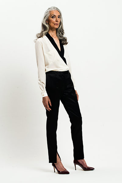 All Ages: Monochrome: Model wears white shirt with black trim and black trousers