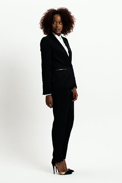 All Ages: Monochrome: Model wears black jacket and trousers with white shirt