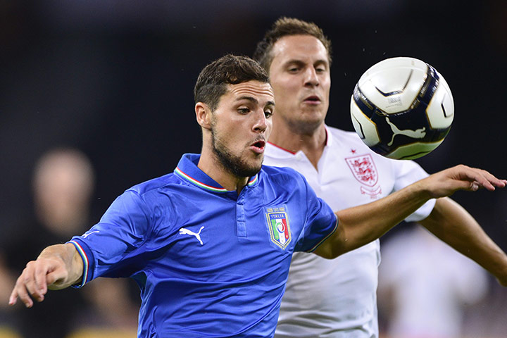 England Gallery: Italian forward Mattia Destro (L) vies w