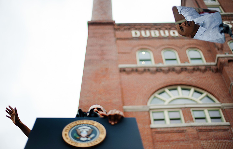 24 hours in pictures: US President Barack Obama is reflected in his teleprompter