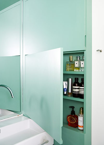 Homes: Bathroom: A small cavity has been turned into a shallow cabinet