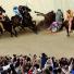 Il Palio: Riders fall as their horses crash during the Palio race in Siena