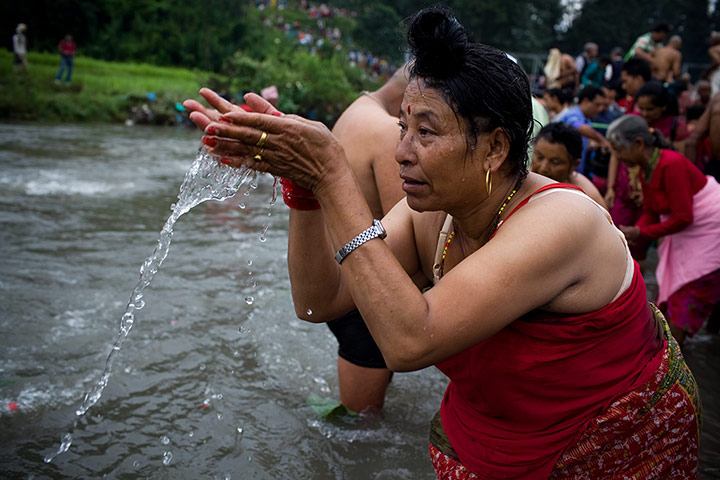 24 hours in pictures: fathers day in Nepal