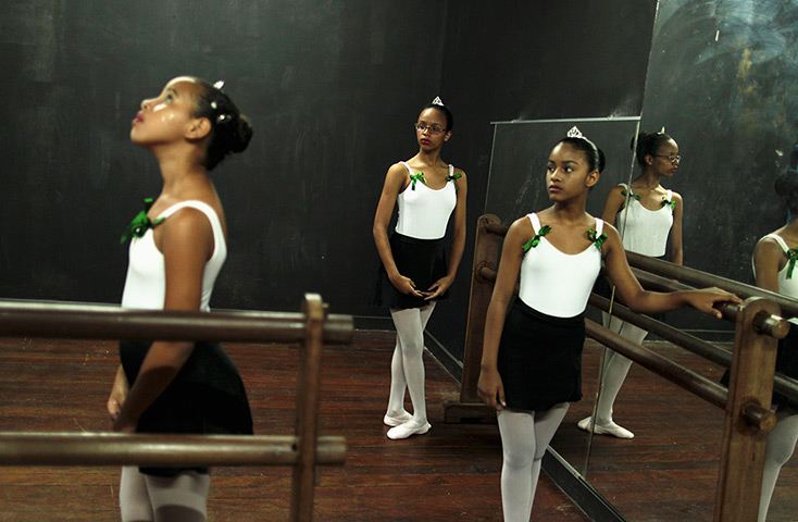 From the agencies: Girls take instructions during their ballet class