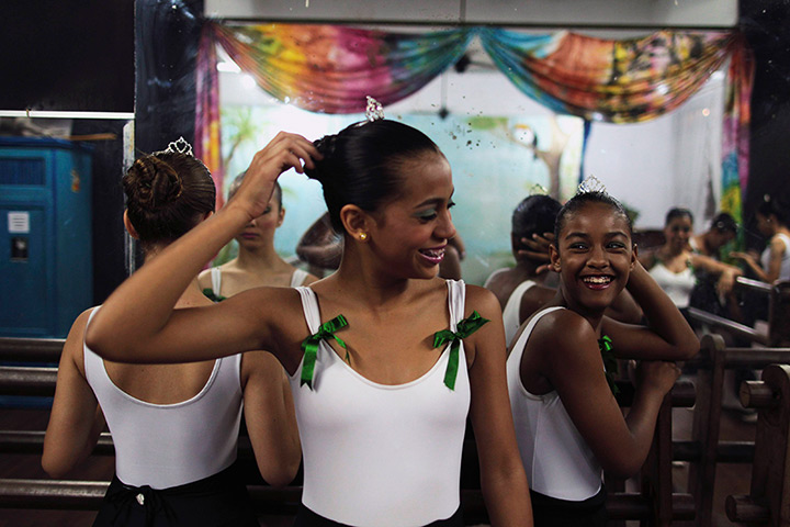 From the agencies: Girls laugh as they wait for rehearsals