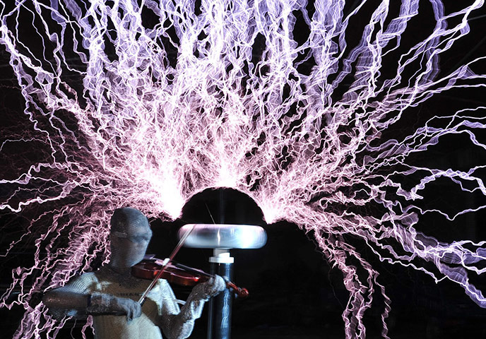 Week in music: A violinist rehearses in a special suit that conducts electricity