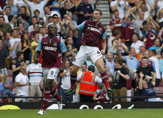 prem gallery: Kevin Nolan celebrates after scoring the only goal