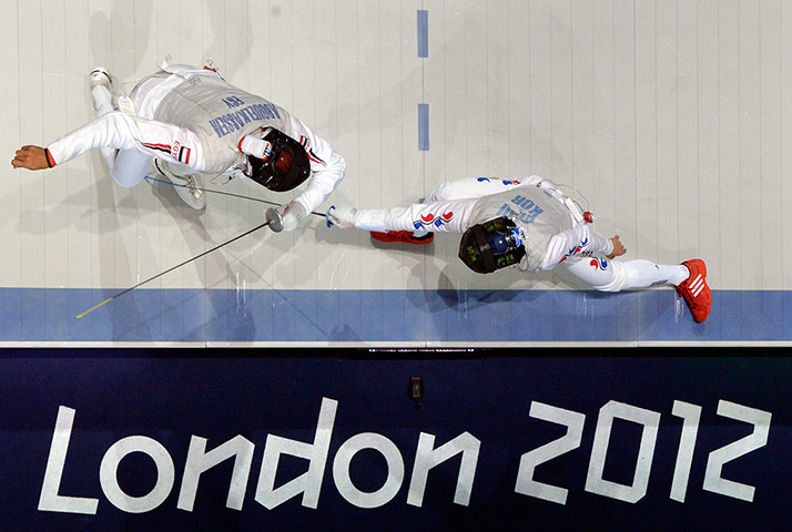 Robotic camera: Korea's Choi Byungchul fencing against Egypt's Alaaeldin Abouelkassem