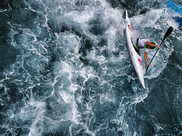Dan Chung Gallery: Switzerland's Mike Kurt paddles the Kayak Single K1 course 