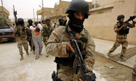 Iraqi troops escort suspected al-Qaida leader