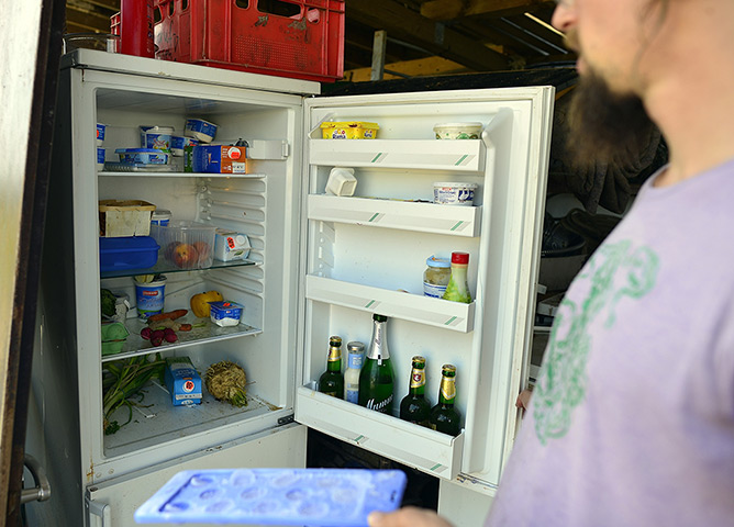 Wagenburg settlement: Discarded food from a supermarket in a fridge