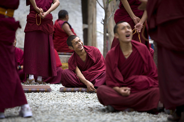 24 hours in pictures: Tibetan Buddhist monks debate in the courtyard of the Sera Monastery