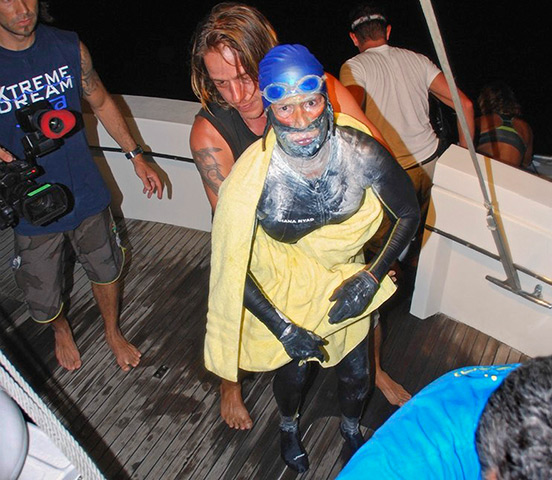 Diana Nyad: Diana Nyad is aided after she was pulled out of the water