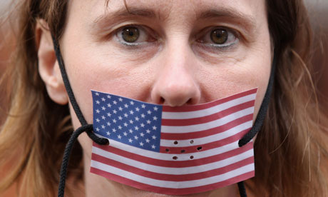 A supporter of Julian Assange, the WikiLeaks founder, outside the Ecuadorean embassy in London. Photograph: Oli Scarff/Getty