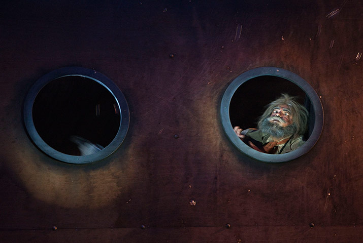 Edinburgh Festival: A character appears behind a port hole