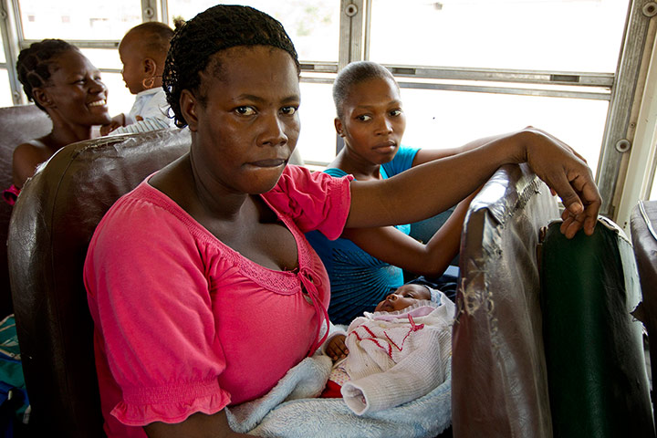 Tropical storm Isaac: Residents of a camp for displaced people evacuate due to tropical storm