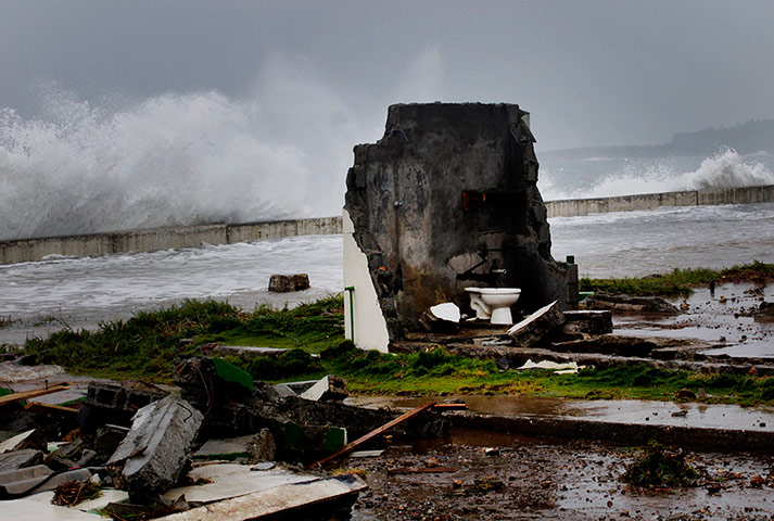 Tropical Storm Isaac: A home that was built twice within the last two years is left in ruins