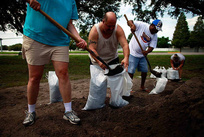 Tropical Storm Isaac: Florida makes preparations for the arrival of the storm by filling sandbags