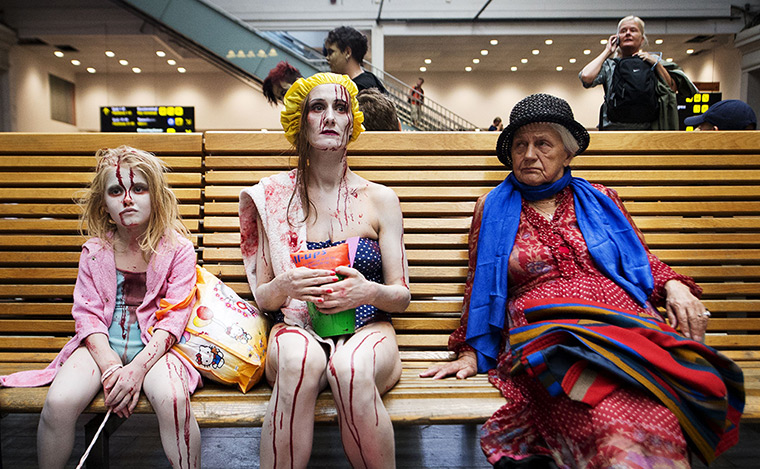 24 hours in pictures: People dressed as zombies wait at a metro station in Stockholm, Sweden