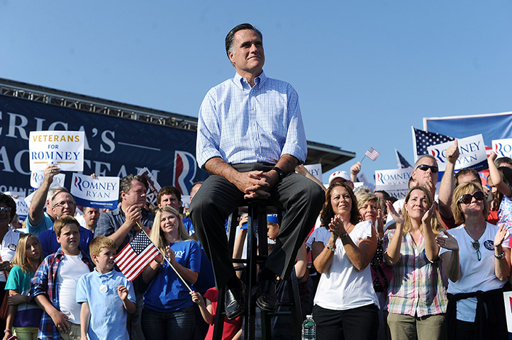 24 hours in pictures: Mitt Romney listens to his running mate Paul Ryan speak in Ohio, USA