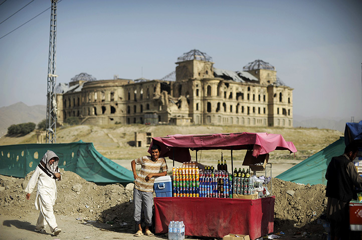 24 hours in pictures: A street vendor near the Darul Aman Palace in Kabul, Afghanistan