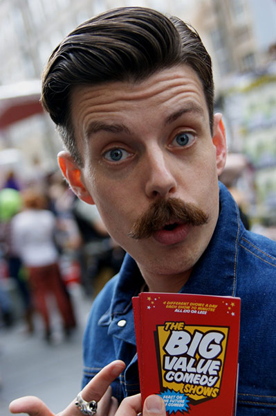 Reader's Edinburgh: A comedian hands out flyers on the Royal Mile