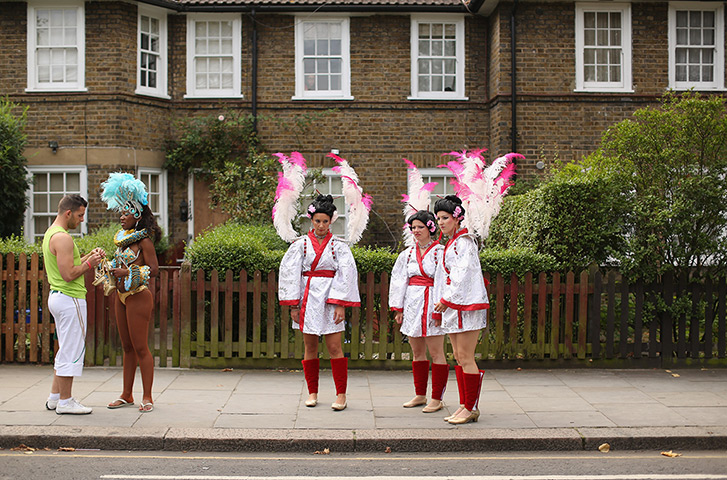24 hours in pictures: Paraiso School of Samba prepare to perform at the Notting Hill Carnival
