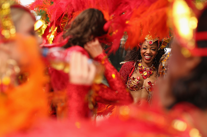 Notting Hill Carnival: Members of the Paraiso School of Samba prepare to perform