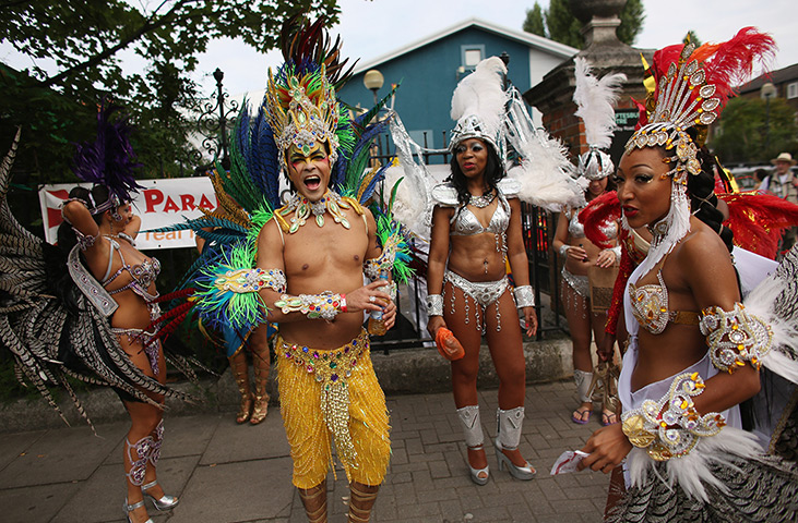 Notting Hill Carnival: Members of the Paraiso School of Samba prepare to perform
