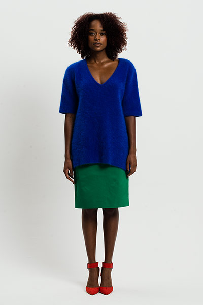 All Ages: Blue: Model wears blue jumper and green skirt