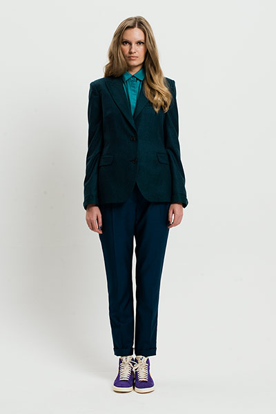 All Ages: Blue: Model wears blue jacket and trousers with a turquoise shirt