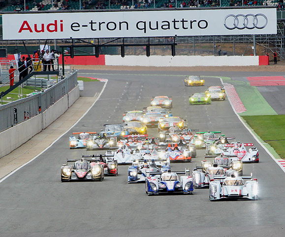 silverstone: A crowded field heads down to the first corner