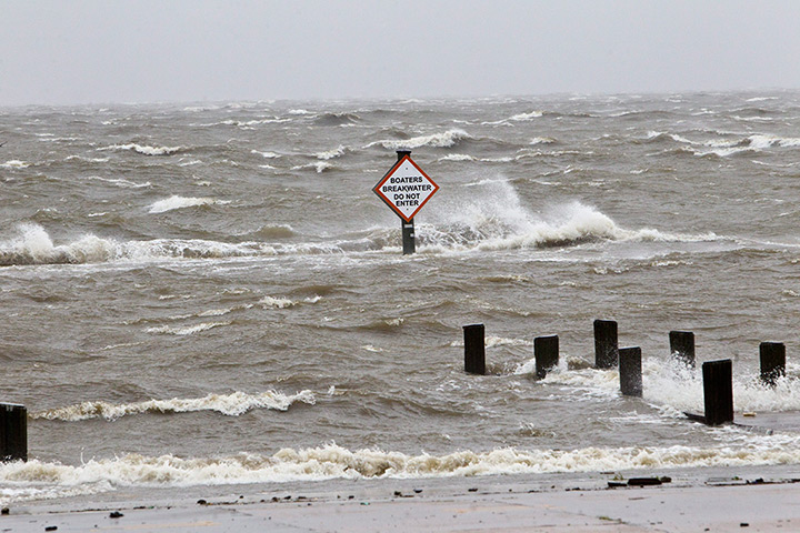 Tropical storm Isaac: A storm surge causes tides to rise and rough waves in Lake Pontchartrain
