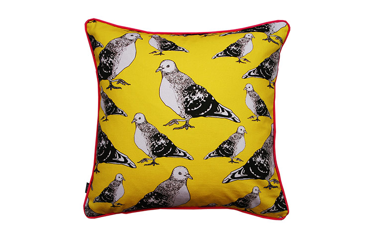 Homes: London Design: Yellow cushion with bird pattern