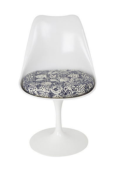 Homes: London Design: Chair showing black and white print from Liberty on the cushion