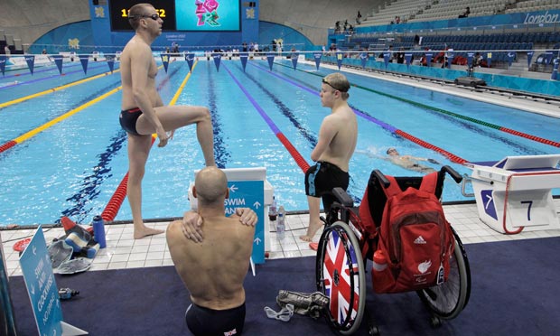 British swimmers warm up in the Aquatic Center ahead of the 2012 Paralympics