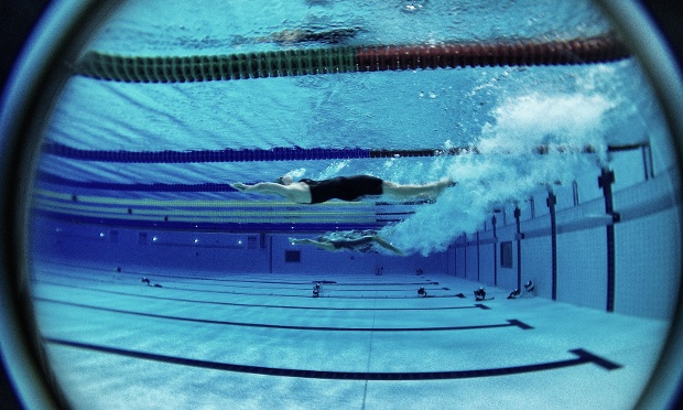 A fisheye view from an underwater window of the Women's 200m backstroke semi-finals