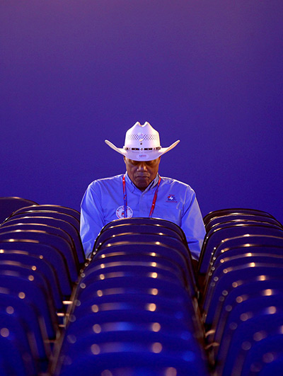 24 hours: Tampa, Florida, USA: A lone delegate sits in the Texas delegates' section