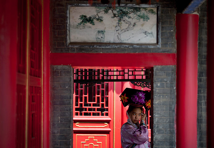 24 Hours: Hebei, China: A girl dressed in a traditional Qing dynasty costume