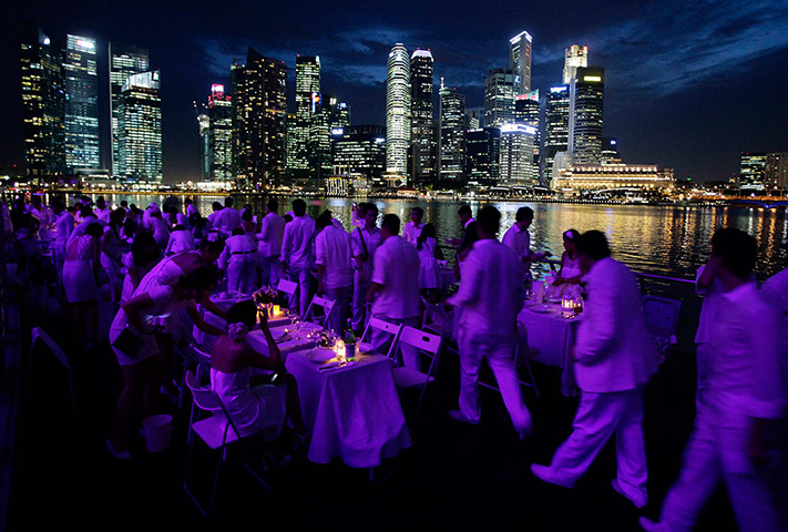 24 Hours: Singapore, Malaysia: People arrive at the 