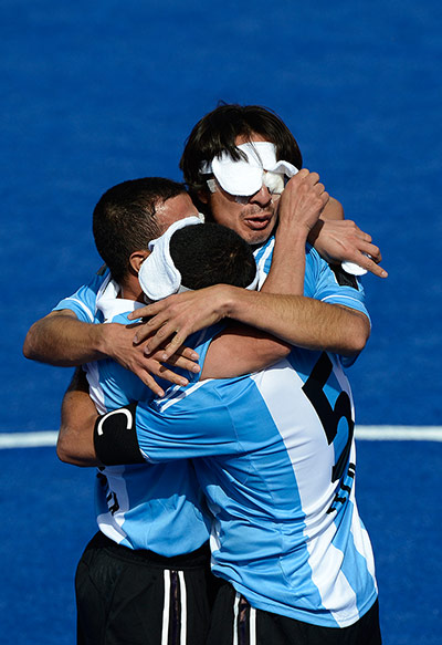 blind football: Argentina's Blind football players celebrate their 2-0 victory over Iran