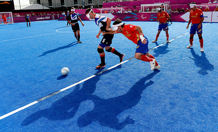 blind football: Adolfo Acosta Rodriguez chases down Daniel English 