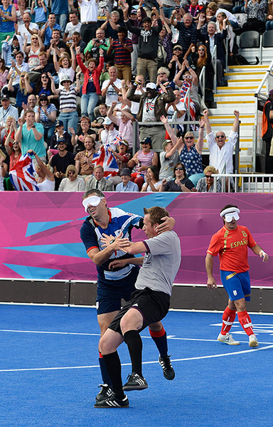 blind football: GB's David Clarke runs into the referee as he celebrates his goal
